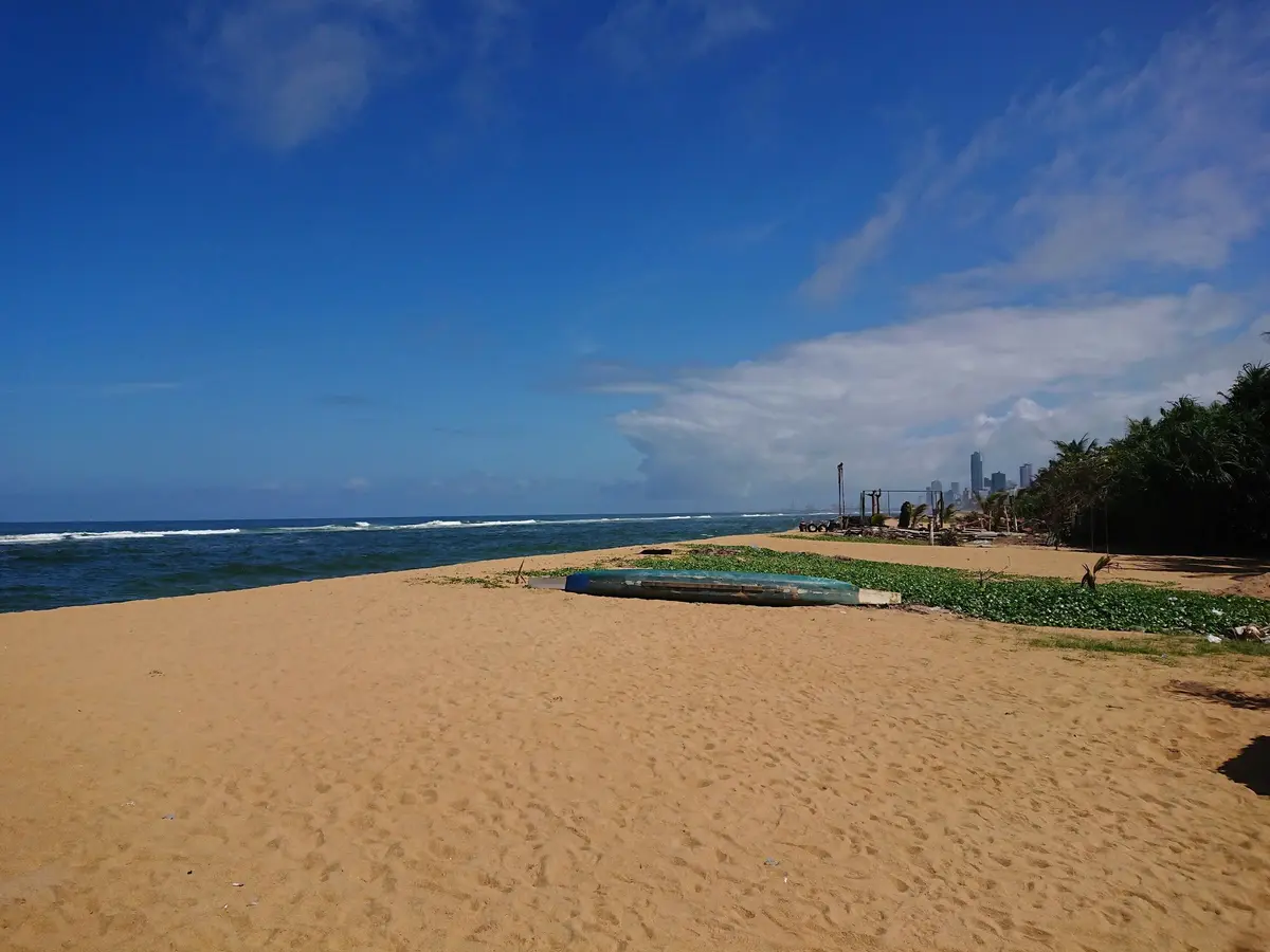Long stretch of beach looking towards Mount Lavinia
